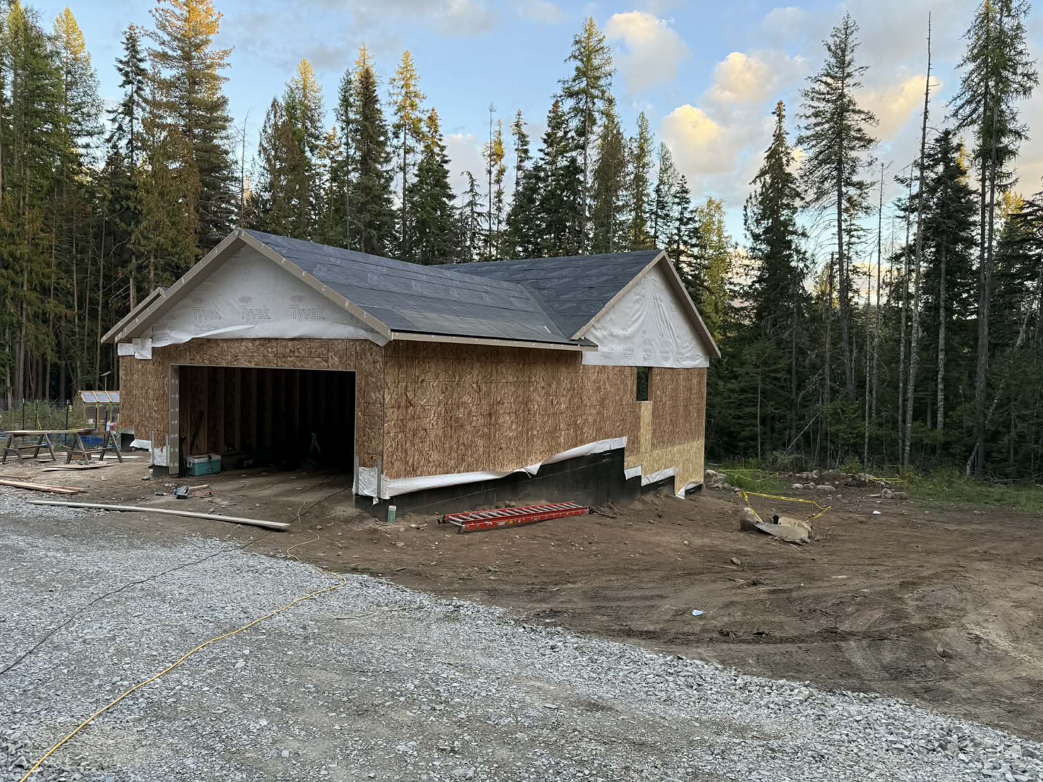 Garage framing with Pacific Northwest pine forest backdrop